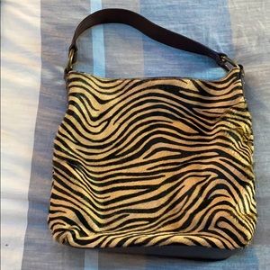 maurizio taiuti purse